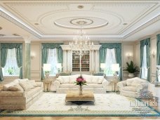 The picture shows a close-up of a bee perched atop a yellow flower. The bee has bright yellow and black stripes and its wings are open, revealing their intricate pattern. The flower is also yellow and appears to have several petals.