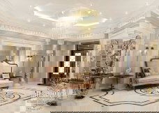 The picture shows a close-up of a white and pink Magnolia flower. The center of the flower is yellow and there is a cluster of petals around it. The petals are a mix of light and dark pink, giving the flower a two-tone look.