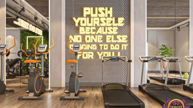 Мотивирующий премиальный дизайн интерьера спортзала